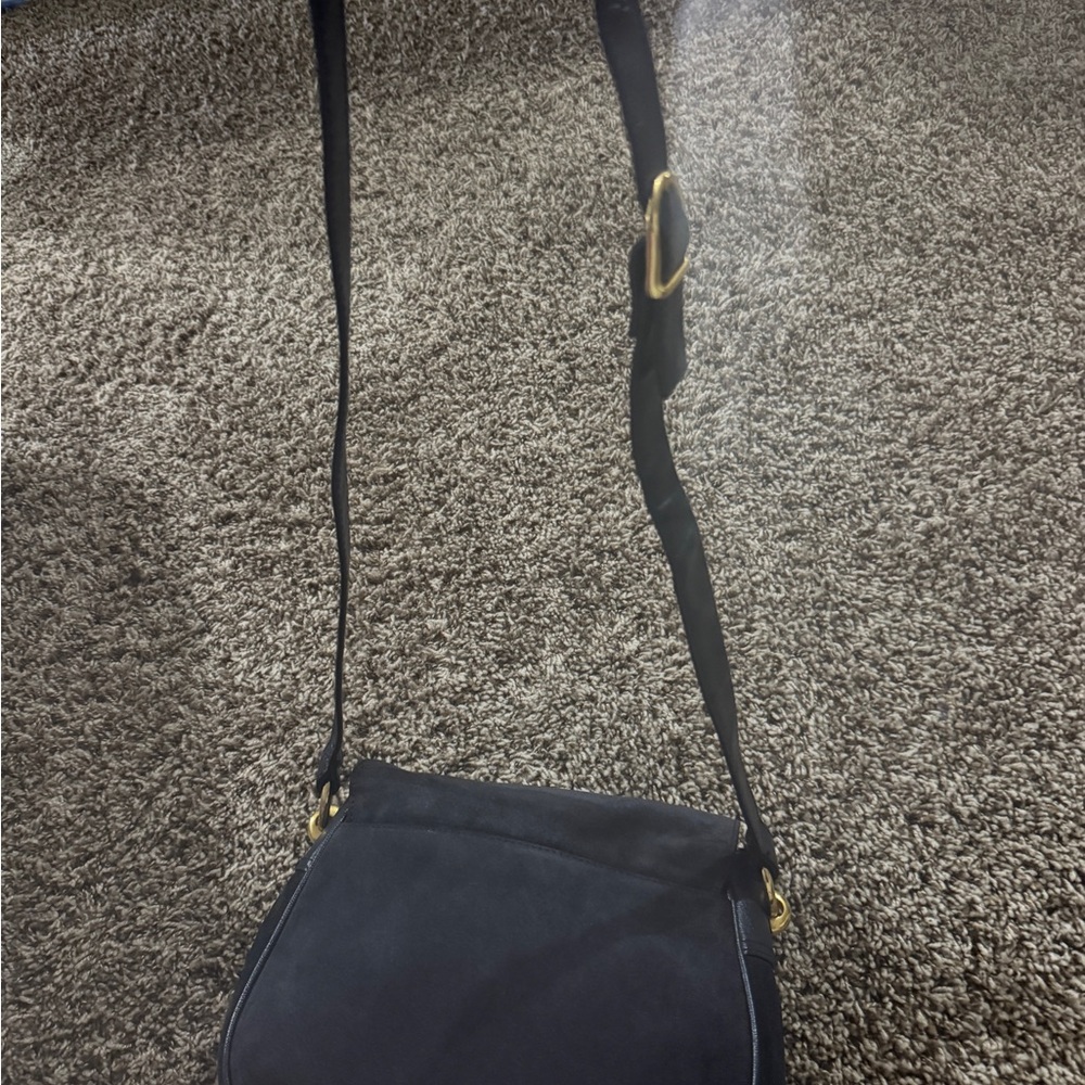 Blue Crossbody Bag with Adjustable Strap and Zipper Closure